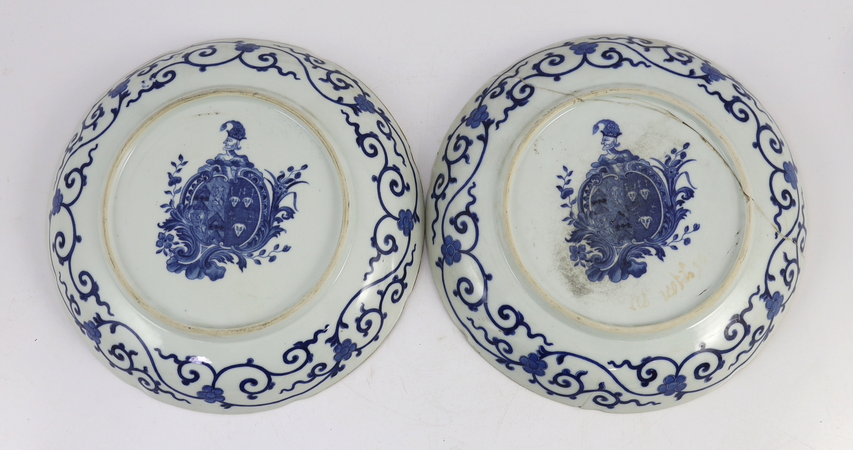 A pair of Chinese blue and white armorial dishes in Japanese Kakiemon style, Qianlong period, c.1752